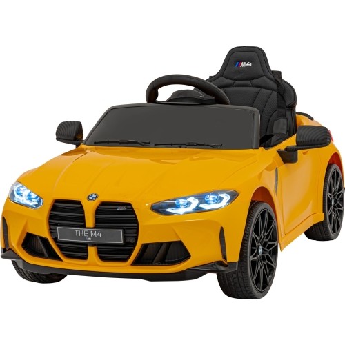 Pojazd elektryczny BMW M4, żółty