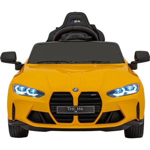 Pojazd elektryczny BMW M4, żółty