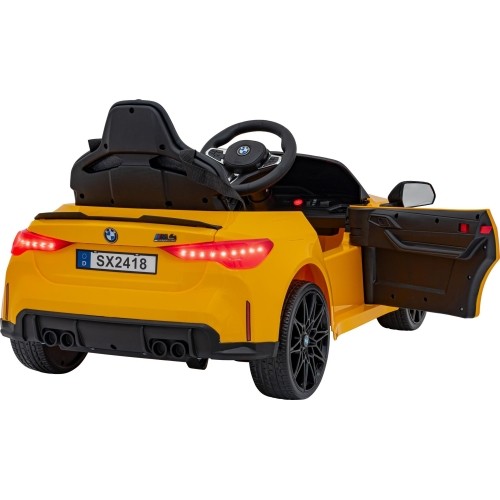 Pojazd elektryczny BMW M4, żółty