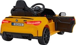 Pojazd elektryczny BMW M4, żółty