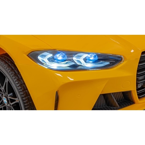 Pojazd elektryczny BMW M4, żółty