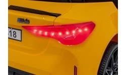 Pojazd elektryczny BMW M4, żółty