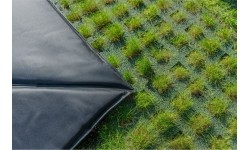 EXIT Dynamiczna trampolina naziemna 305x519cm z płytkami bezpieczeństwa Freezone - czarna