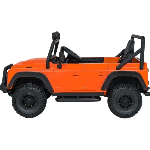 Pomarańczowy pojazd koncepcyjny Land Rover Defender 110 SVX