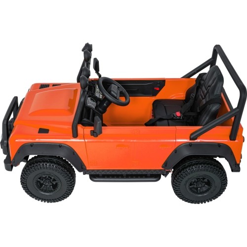 Pomarańczowy pojazd koncepcyjny Land Rover Defender 110 SVX