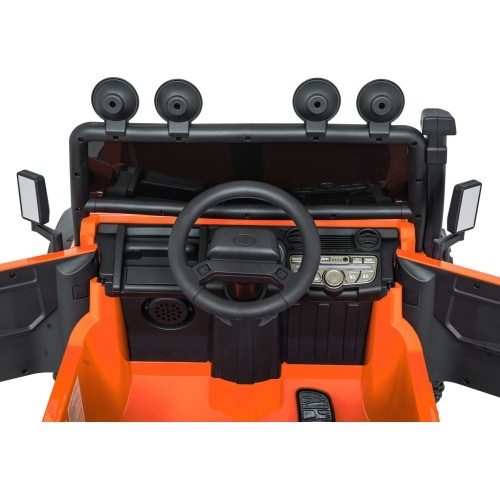 Pomarańczowy pojazd koncepcyjny Land Rover Defender 110 SVX