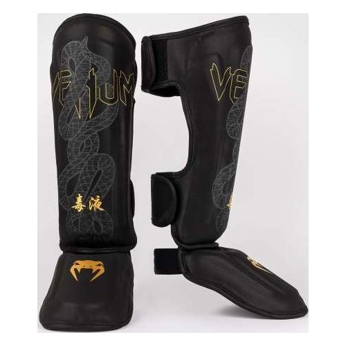 Nagolenniki Venum Serpenti - czarny/srebrny/złoty