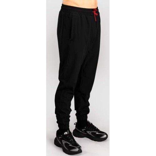 Spodnie dresowe Venum x Mike Tyson Tiger – głęboka czerń/intensywna czerwień