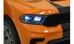 Pojazd elektryczny Dodge Durango, pomarańczowy