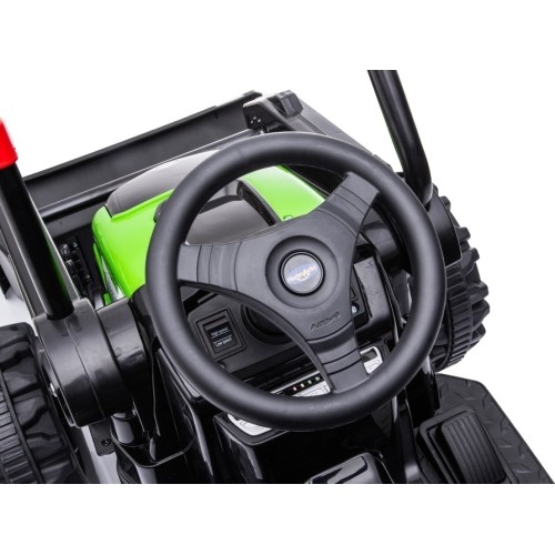 Pojazd elektryczny traktor z koparką, zielony