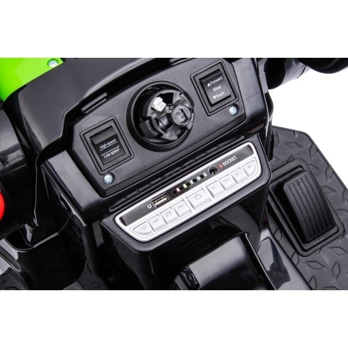 Pojazd elektryczny traktor z koparką, zielony