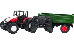 Czerwony traktor zdalnie sterowany z zieloną naczepą