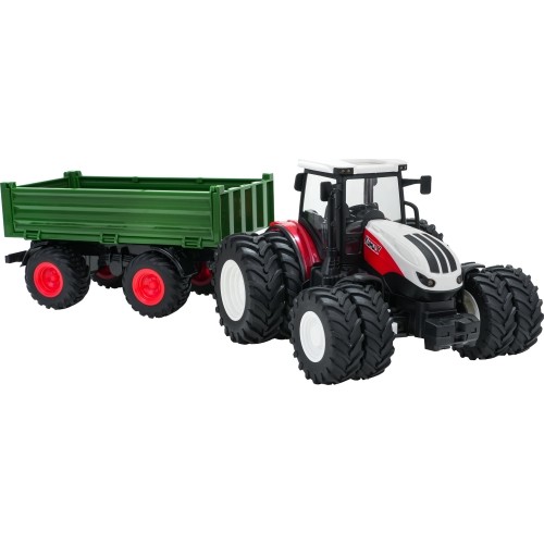 Czerwony traktor zdalnie sterowany z zieloną naczepą