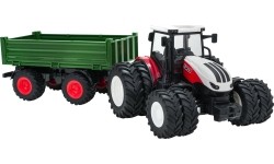 Czerwony traktor zdalnie sterowany z zieloną naczepą