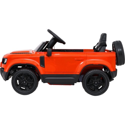 Pojazd elektryczny Land Rover Defender, pomarańczowy