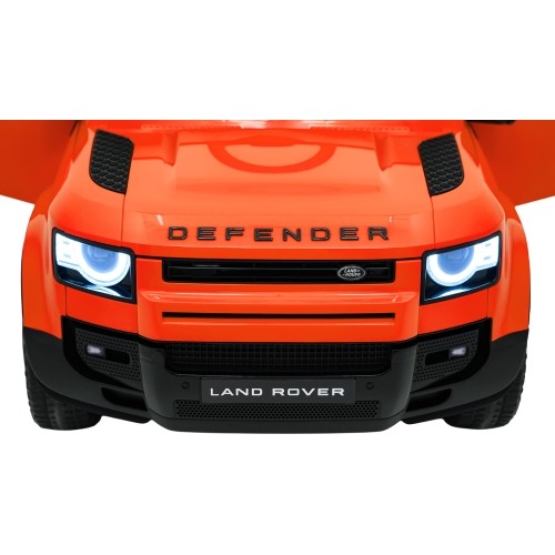 Pojazd elektryczny Land Rover Defender, pomarańczowy