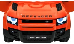 Pojazd elektryczny Land Rover Defender, pomarańczowy