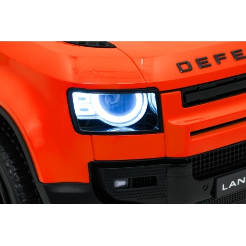 Pojazd elektryczny Land Rover Defender, pomarańczowy