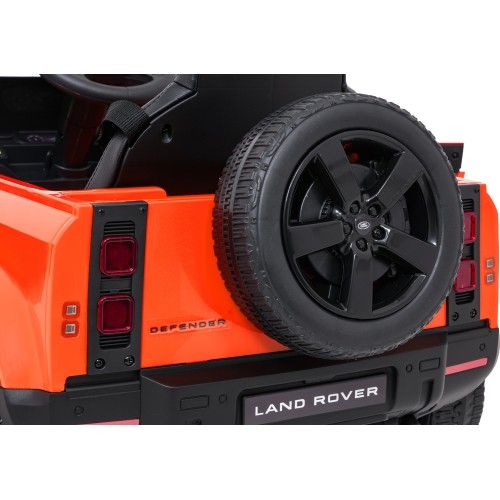 Pojazd elektryczny Land Rover Defender, pomarańczowy