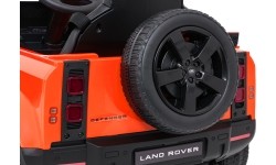 Pojazd elektryczny Land Rover Defender, pomarańczowy