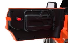 Pojazd elektryczny Land Rover Defender, pomarańczowy